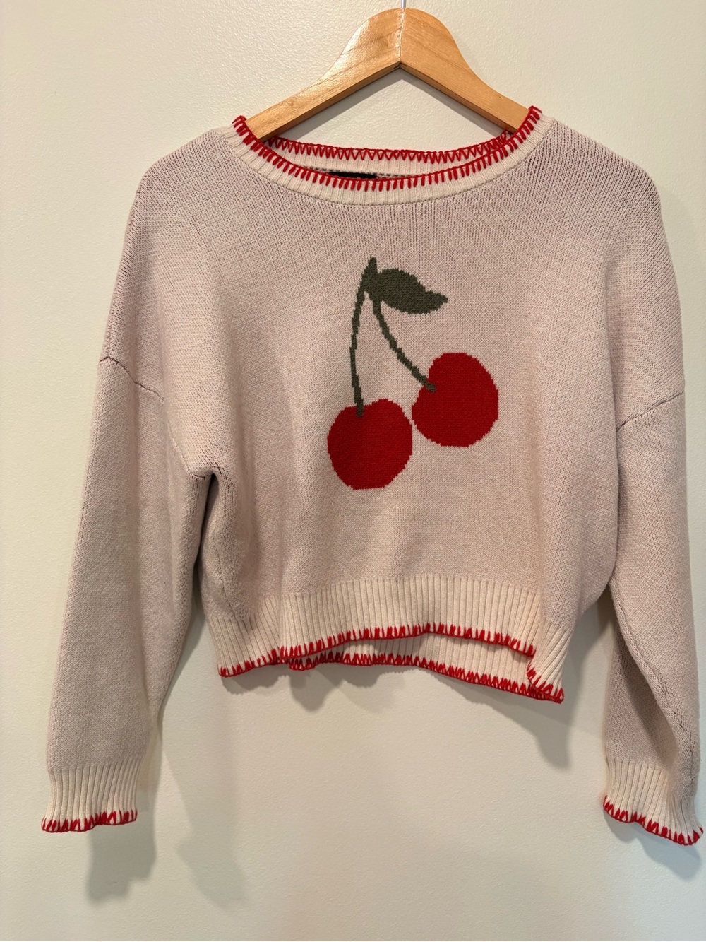 Cream Cherry Sweater with Red Trim